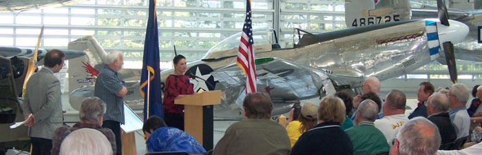 Valerie Alexander speaks at the Jim Walker 101st Birthday Celebration at the Evergreen Aviation Museum in McMinnville Oregon