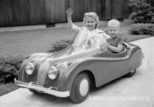 Kids riding in the Jaguar XKE 120 around 1959 in Portland Oregon